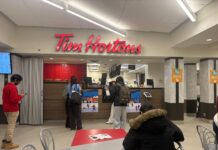 Double-double the wait: What’s driving long lineups at the Nideyinàn Tim Hortons? People standing in line at the Nideyinàn Tim Hortons.