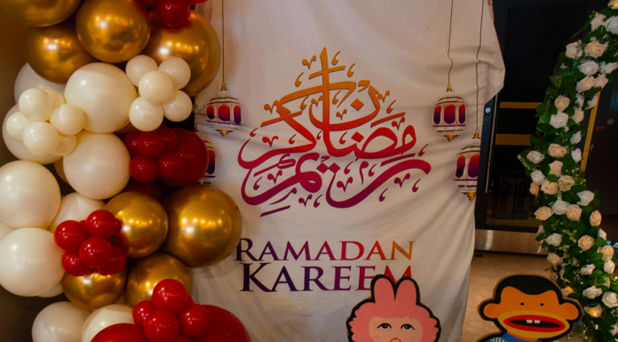 In photos: ‘Home away from home’ as Ottawa Muslim community kicks off month of Ramadan A display with a a tree of balloons, a sign that says "Ramadan Kareem" and two characters