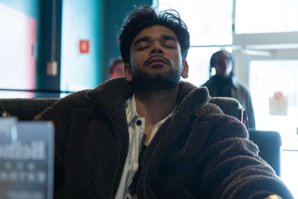 Aryan Singh with his eyes closed