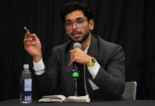 Q&A: CUSA presidential candidate Aryan Singh on finances, supporting students and advocacy Aryan Singh holds a microphone while speaking at the CUSA presidential debate.