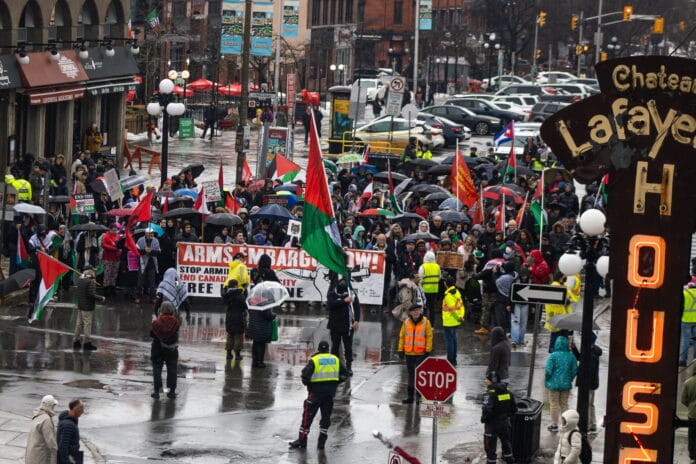 Crowd of protesters in downtown Ottawa