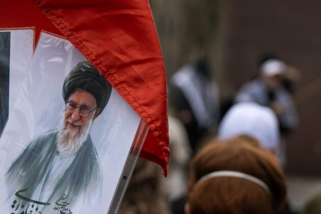Sign and flag of Ayatollah Ali Khamenei