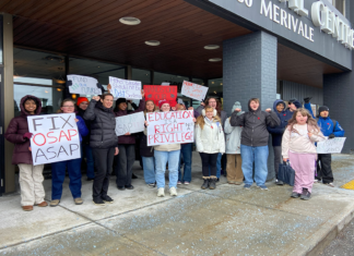 ‘OSAP was their only hope:’ Merivale High School students protest OSAP cuts Over a dozen teenagers stand in front of a building, many holding signs. Visible signs say "Education is a right, not a privelege," "Fix OSAP ASAP," "Fund our futures," "Higher education shouldn't be a debt sentence," "Hands off our future."