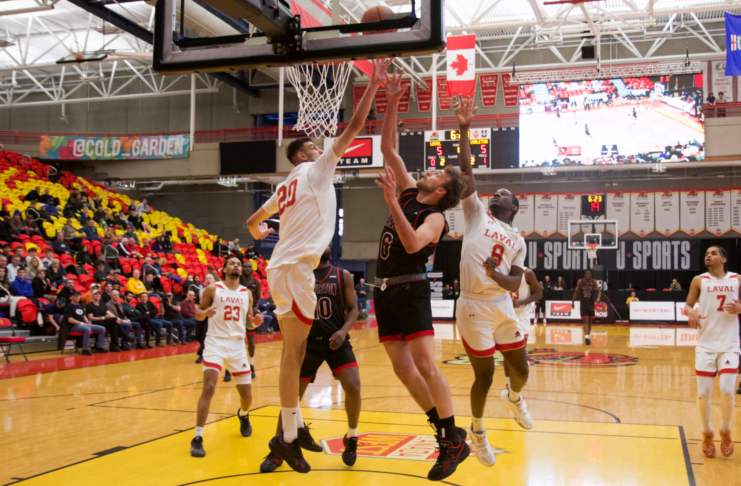 FINAL 8 quarterfinal roundup: Ravens to meet TMU in semifinals one week after OUA championship game. Basketball player layup