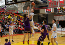 Gaiters beat reigning national champs Vikes, 66-65 in semifinals, advance to play Carleton in final Victoria player dunking the basketball