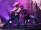 Bluesfest Day 1 review: Cody Johnson delivers fireworks and musical insights under cloudy skies Guitarists perform beside one another on stage