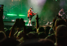 Bluesfest Day 3 Review: Hardy and BigXThaPlug show off country rock ballads and trap beats Musician wears a Sens jersey singing to a crowd