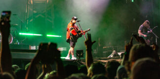 Bluesfest Day 3 review: Hardy and BigXThaPlug show off country rock ballads and trap beats Musician wears a Sens jersey singing to a crowd