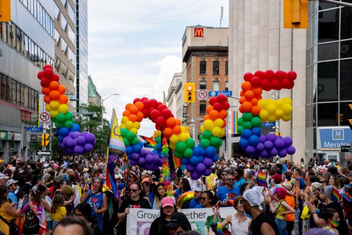 LOVE written with balloons at pride.